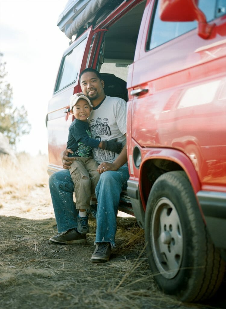 Fel with his son and their Vanagon at Descend on Bend 2014